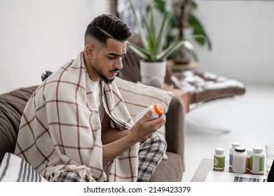 A Man Feeling Unwell And Taking Pills