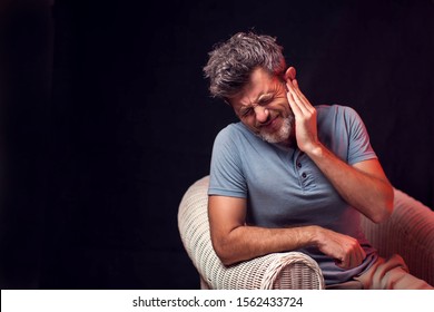 Man Feels Strong Ear Ache. People, Healthcare And Medicine Concept