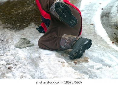 A Man Fell Down On A Slippery Road, Outdoor Shot