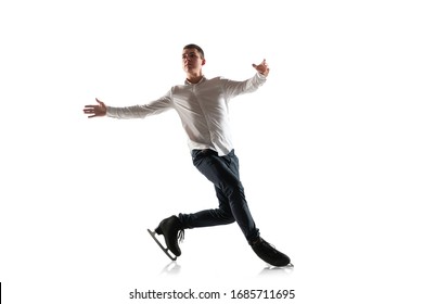 Man Figure Skating Isolated On White Studio Backgound With Copyspace. Professional Practicing And Training In Action And Motion On Ice. Graceful And Weightless. Concept Of Movement, Sport, Beauty.