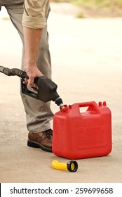 Man Filling Empty Gas Can