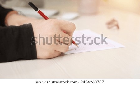 Man is filling OMR sheet handing with pen Omr, Sheet, Fill