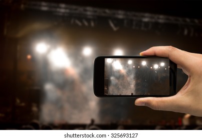 Man Filming A Concert With Your Mobile Phone No Person