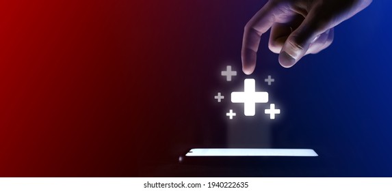 Man finger clicks on the open plus icon.Plus symbol for your web site design, logo, app, UI. Which is a virtual projection from a mobile phone. Neon , red blue lights. - Shutterstock ID 1940222635