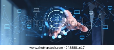 Man finger touch data server hologram hud, files share or transfer between multiple devices. Concept of cloud storage, big data processing, backup and synchronization