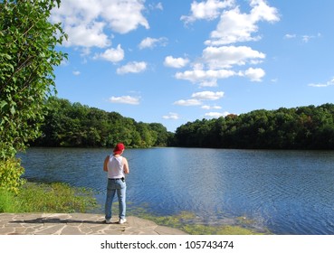 Man Fishing At Greenbelt Park In Maryland, USA