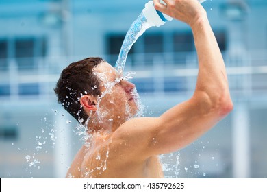 Man Fitness Runner Drinking And Splashing Water In Her Face.