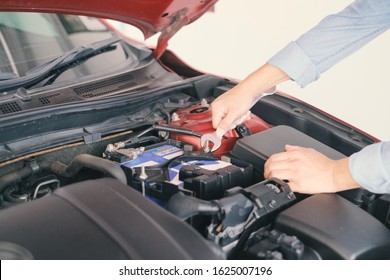 A man fixing the car engine with copy space. - Shutterstock ID 1625007196