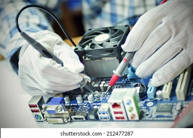 Man Fixing Mother Board