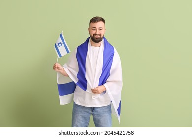 Man With The Flag Of Israel On Color Background