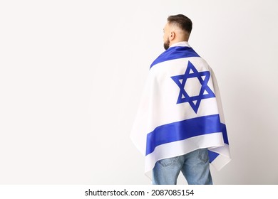 Man With The Flag Of Israel On Light Background