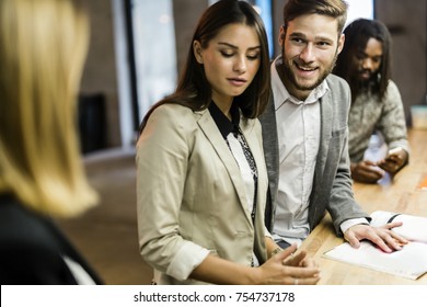 Man Flirting With Another Woman In A Bar