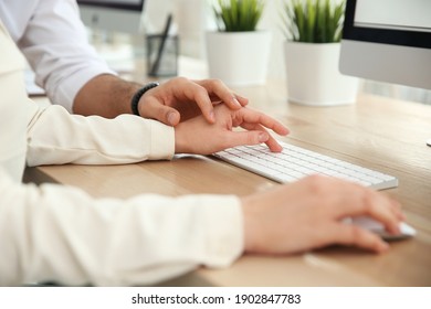 Man Flirting With His Colleague During Work In Office, Closeup