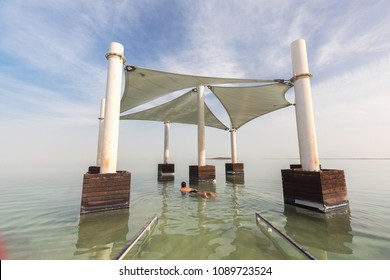 Man Floating On His Chest At The Dead Sea In Israel