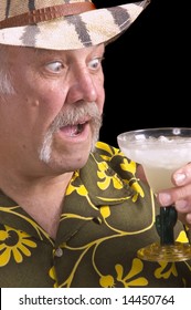 Man In Floral Shirt Hawaiian Shirt, With A Fu Manchu Mustache, Safari Hat And Margarita Doing A Jimmy Buffet Impersonation