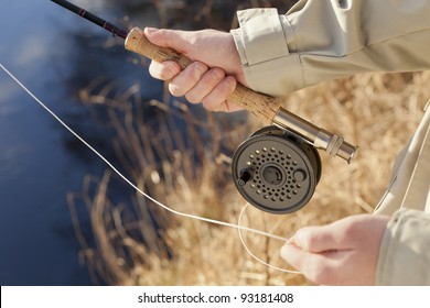 Man Fly Fishing In A River