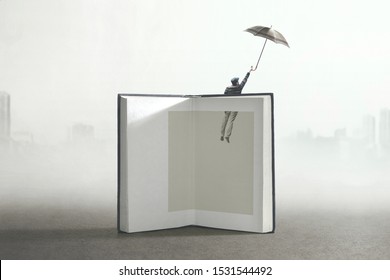 man flying out of a book; surreal concept