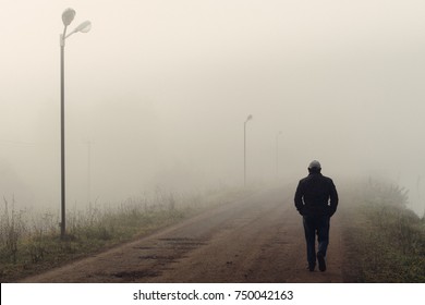 Similar Images, Stock Photos & Vectors of Lonely man walking down the ...