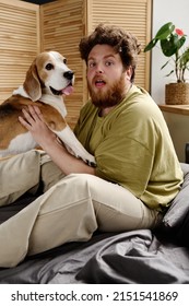 Man Fooling Around With His Pet