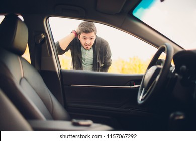 Man Forgot The Key Inside Of His Car.Transportation, Crime And Ownership Concept