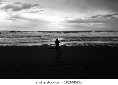 man at front of the beach