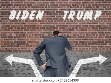 Man in front of a brick wall with Biden and Trump inscriptions