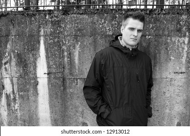 Man in front of a wall