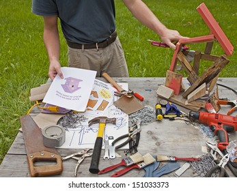 A Man Is Frustrated And Angry At Building A Bad Birdhouse.