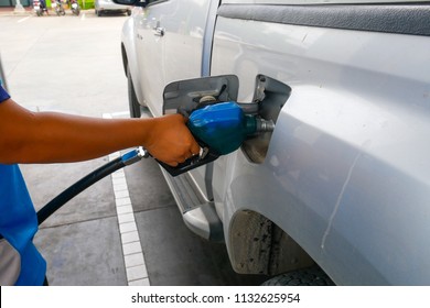 Man Is Fueling  The Diesel In The Pickup Truck.