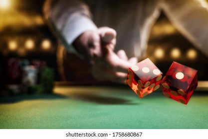 Man gambling at the craps table at the casino - Selective focus