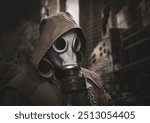 Man in gas mask and hooded cloak surrounded by clouds of toxic smoke in cityscape