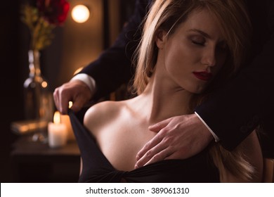 Man Gently Undressing Elegant Beautiful Aroused Woman