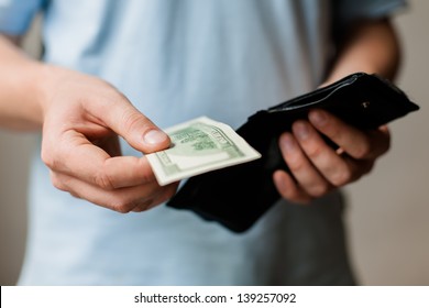 Man Gets Money From The Wallet