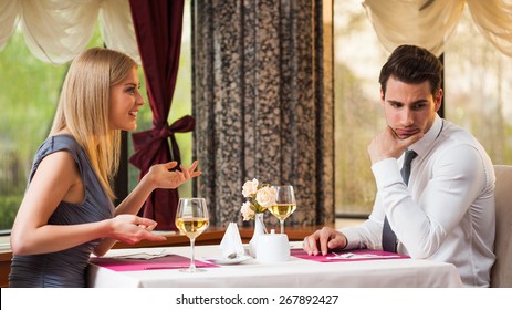 Man is getting bored on first date