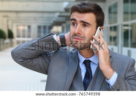 Man getting devastating news on a phone call