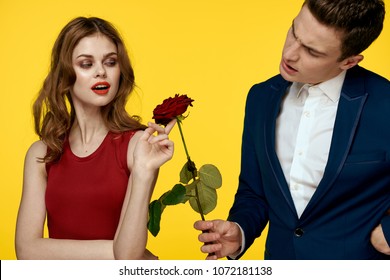 Man Gives A Flower To A Narcissist Lady                               