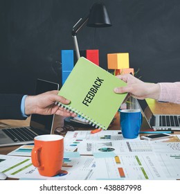 Man Giving Book Which Written Feedback