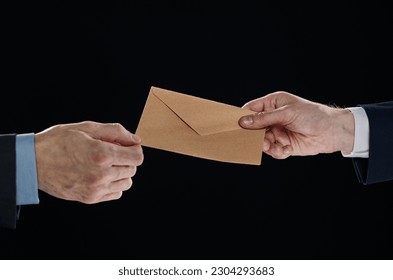 Man giving bribe money, closeup of hands - Shutterstock ID 2304293683