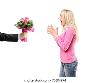 Man Giving A Bunch Of Flowers And Surprised Woman Isolated On White Background