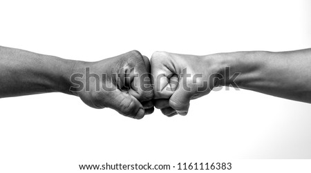 Man giving fist bump, monochrome, black and white image. 