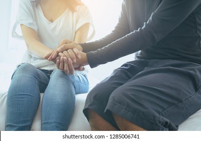 Man giving hand to depressed woman,Suicide prevention,Positive attitude and help open mind,Mental health care concept
