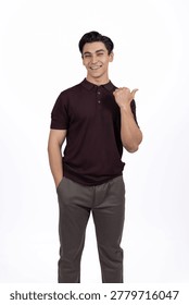 Man giving thumbs up while gesturing approval and success smiling in professiona