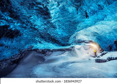 Man in the glacier cave, extreme travel to Iceland, wonderful natural attraction, traveling to Skaftafell, Vatnajokull national park