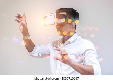 Man With Glasses Of Virtual Reality For Game Or Technology And Learning . Future Technology Concept.
