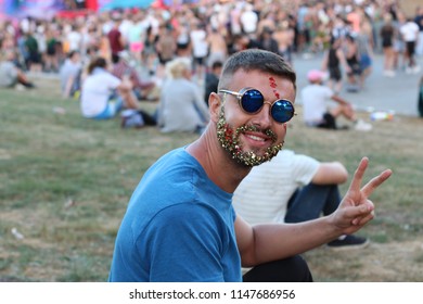 Man With Glitter Beard In Music Festival