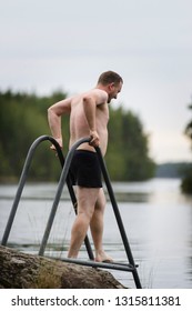 Man Going To Bathe In Lake Water After Taking Finnish Sauna