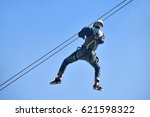 A man going down the zip line