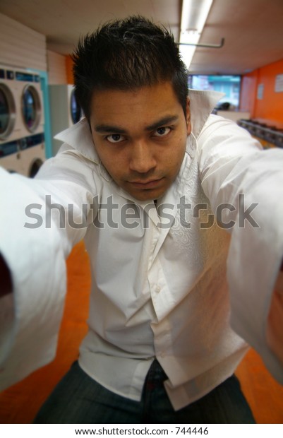 Man Grabbing Camera Local Laundromat Stock Photo Edit Now 744446