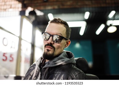 a man in a gray jacket