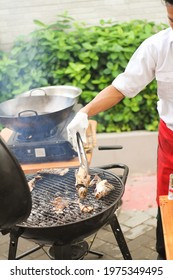 Man Grilling Fish Outdoor Making Barbecue